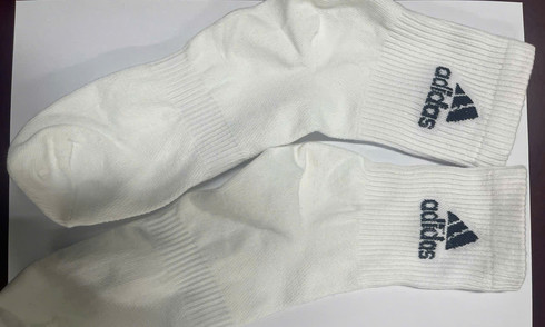 200.000 đôi tất giả nhãn hiệu Nike, Adidas bán ra thị trường
