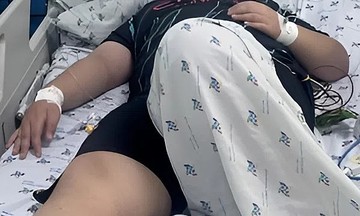 Bé trai béo phì nguy kịch sau ba ngày sốt cao