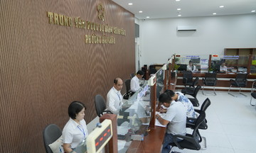 Ra mắt sổ tay hướng dẫn thủ tục đất đai cho chính quyền hai cấp