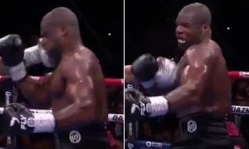 Usyk đấm văng bảo hộ răng của Dubois