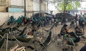 Electric scooter charging stations power up Ho Chi Minh City's cafe culture
