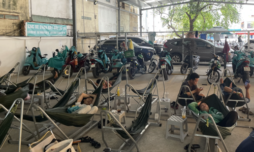 Electric scooter charging stations power up Ho Chi Minh City's cafe culture