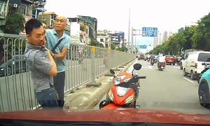 Motorcyclist assaults car driver after minor collision