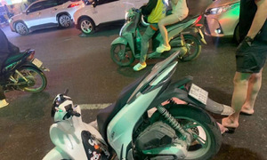 Scooter plunges into Hanoi sinkhole