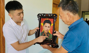 Restoring fallen soldiers: one photo at a time
