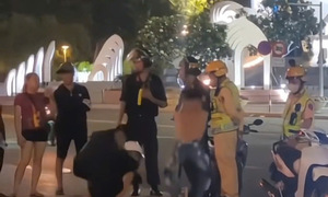 Teens made to do squats as punishment for not wearing helmets