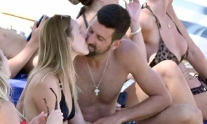 Djokovic unwinds with a $130,000 bottle of champagne