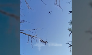 Ukrainian soldiers use drone to deliver electric scooter, aiding comrade's escape