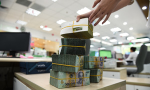 Real estate bond maturities peak this month