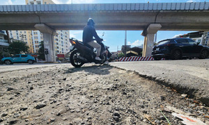 Uneven roads follow underground infrastructure work in Hanoi
