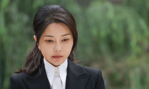 Former South Korean first lady questioned by prosecutors