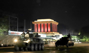Military vehicles conduct overnight drills in Ba Dinh square