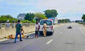 Traffic police lieutenant struck by motorbike on highway
