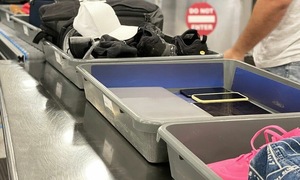 Don't leave your phone directly in airport security bins