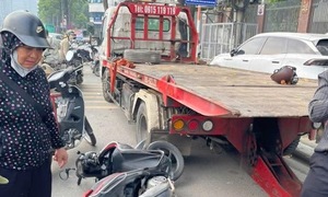 Young man dies after crashing into parked tow truck