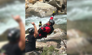 California rescuers save man trapped behind waterfall for two days