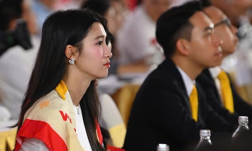 Former Miss World Vietnam runner-up Phuong Nhi attends event with husband