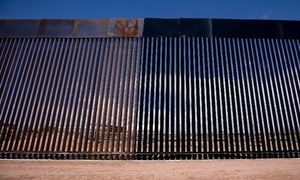 Trump orders border wall painted black