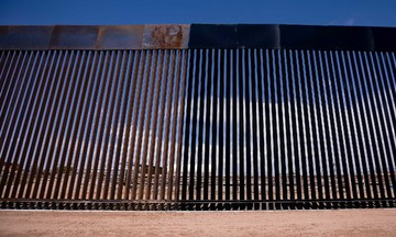 Trump orders border wall painted black