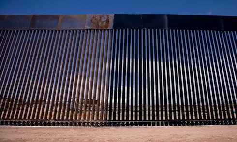 Trump orders border wall painted black