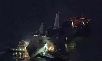 US navy ship catches fire off Japan's coast