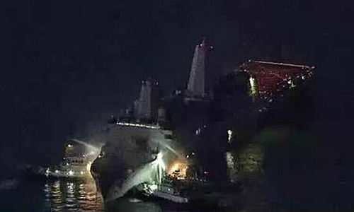 US navy ship catches fire off Japan's coast