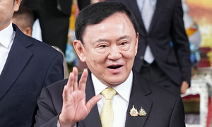 Thaksin acquitted of lese majeste charges