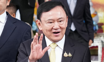 Thaksin acquitted of lese majeste charges
