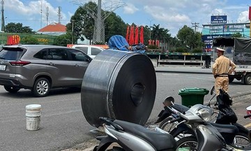 Steel coils tumble onto street