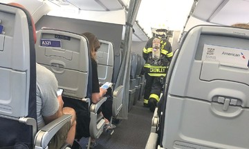 Passenger's device catches fire, forcing emergency landing for plane with 166 onboard