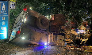 Police rescue trapped driver after truck crashes into tractor-trailer
