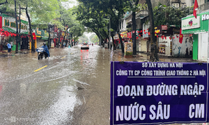 Hanoi businesses disrupted by flooding
