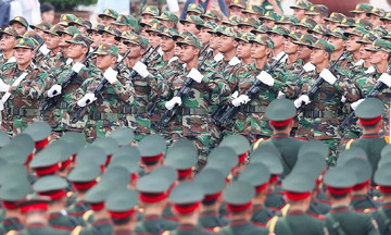 Troops and equipment gather for national day parade rehearsal