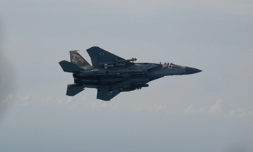 Israel launches airstrikes and ground raid near Syrian capital