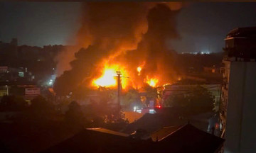 Early morning fire engulfs printing workshop