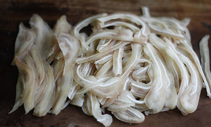 Man nearly dies after eating undercooked pig's head