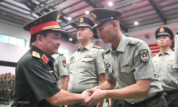 Defense vice minister meets with international troops for national day parade