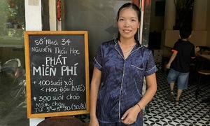 Free food and refreshments offered to parade spectators in Hanoi