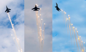 Su-30MK2 fighters deploy flares over Ba Dinh square