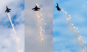 Su-30MK2 fighters deploy flares over Ba Dinh square