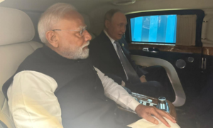 Indian prime minister and Putin share a ride and a handshake