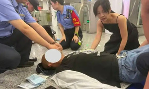 Nurse bites off acrylic nails to save passenger having a seizure
