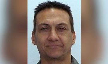 Australian gunman kills two police officers, hides in forest
