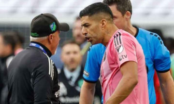 Suarez receives six-match ban