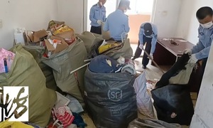 Shanghai woman rents two apartments to hoard 30 tons of trash