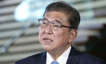 Japanese prime minister resigns as ruling party leader