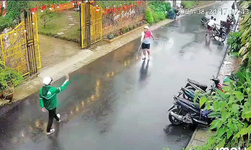 Husband assists in assault on wife