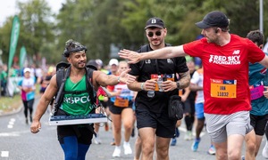 DJ Schak spins tunes while running half marathon
