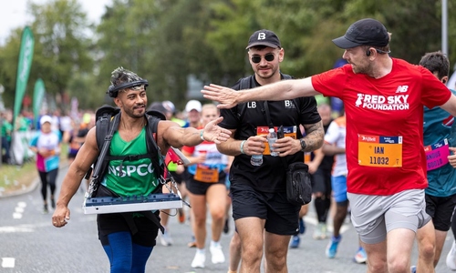 DJ Schak spins tunes while running half marathon