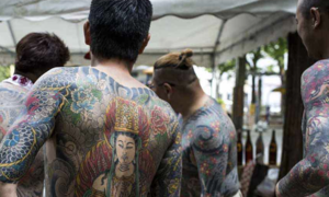 Tattooed men for hire: a controversial service in Tokyo